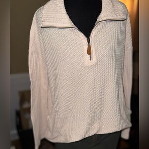 Kori Cream Textured Turtleneck Sweater with front pockets